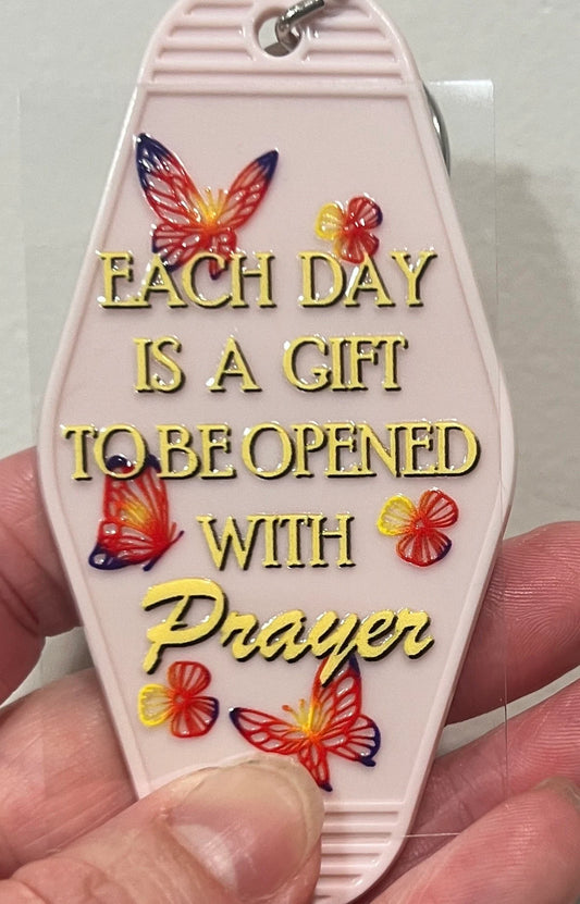 Keychain Each Day Is A Gift To Be Opened With Prayer  UV DTF Decal