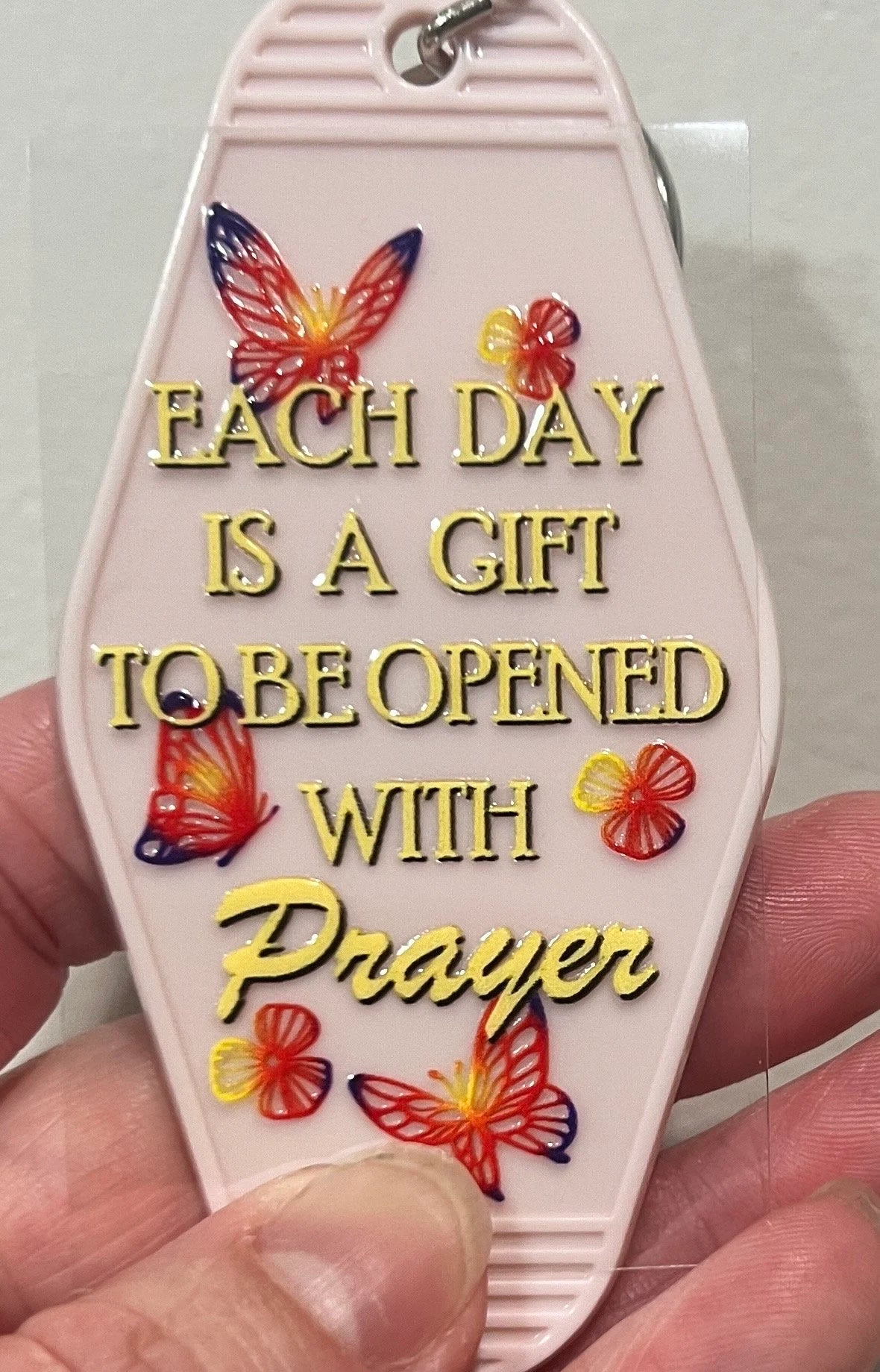 Keychain Each Day Is A Gift To Be Opened With Prayer  UV DTF Decal